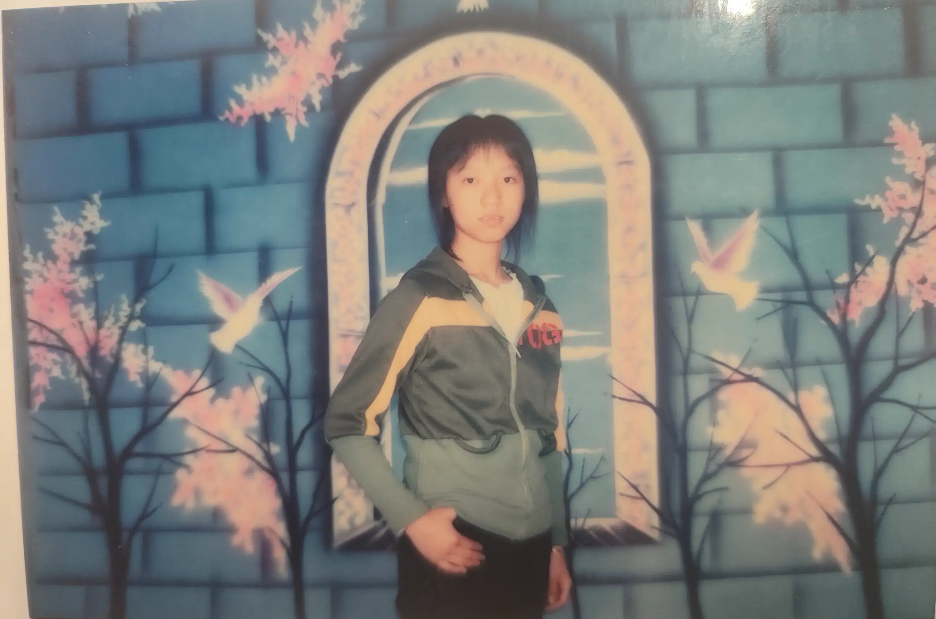 王徐梅,2006年。那个年纪的女生,总有一股让人羡慕的干净利落劲儿。